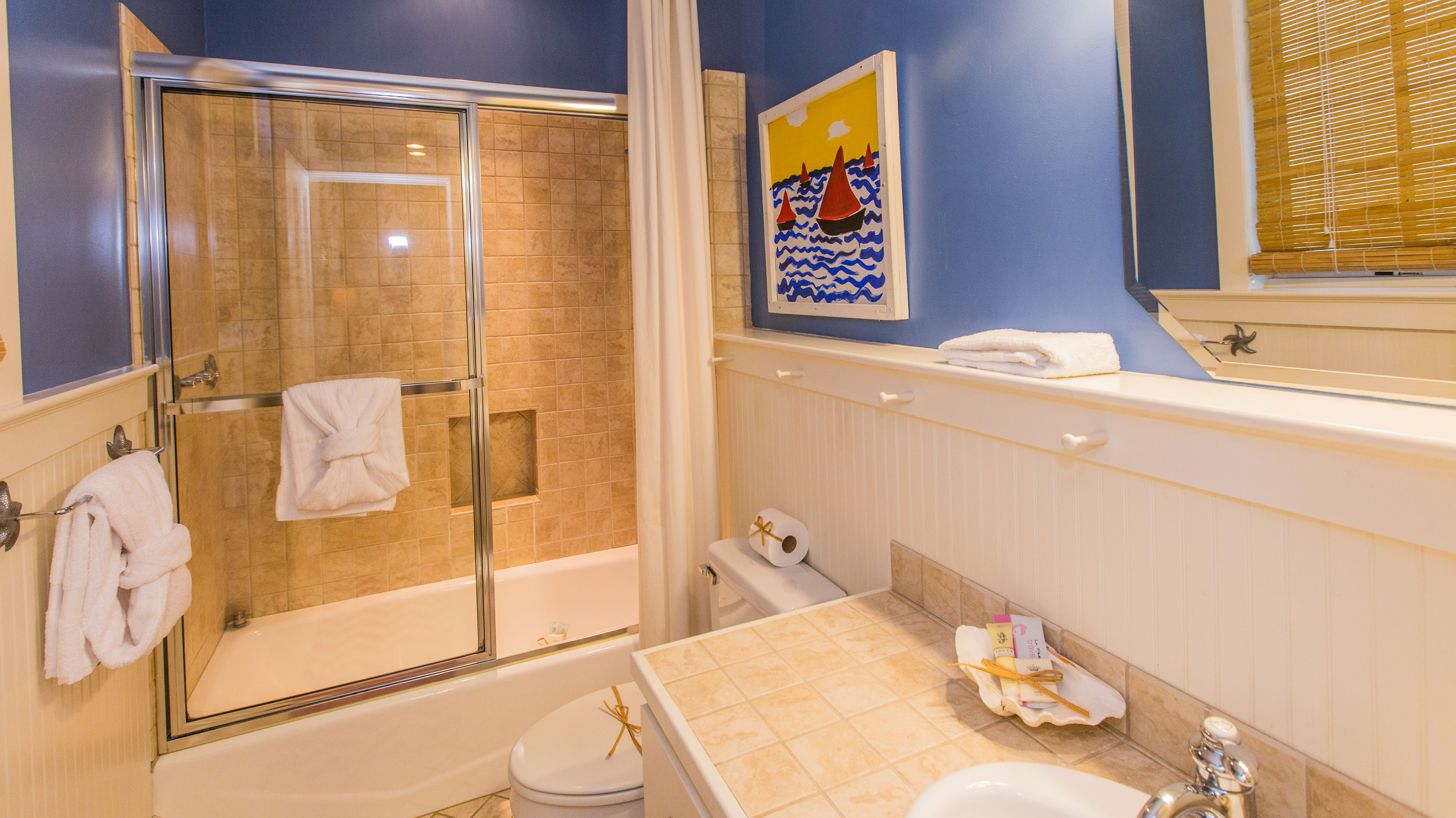 En suite bath has tub/shower combination
